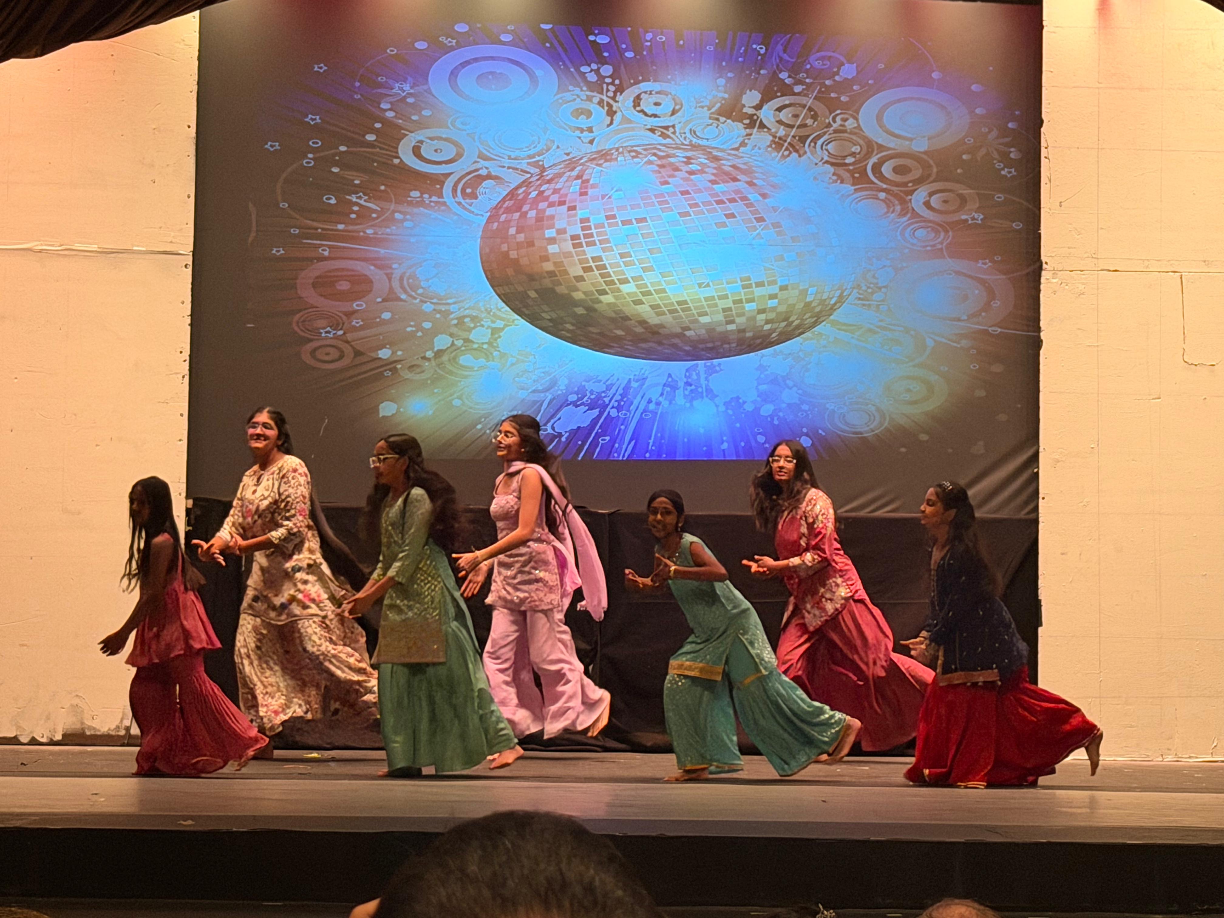 G2 performing at International Night